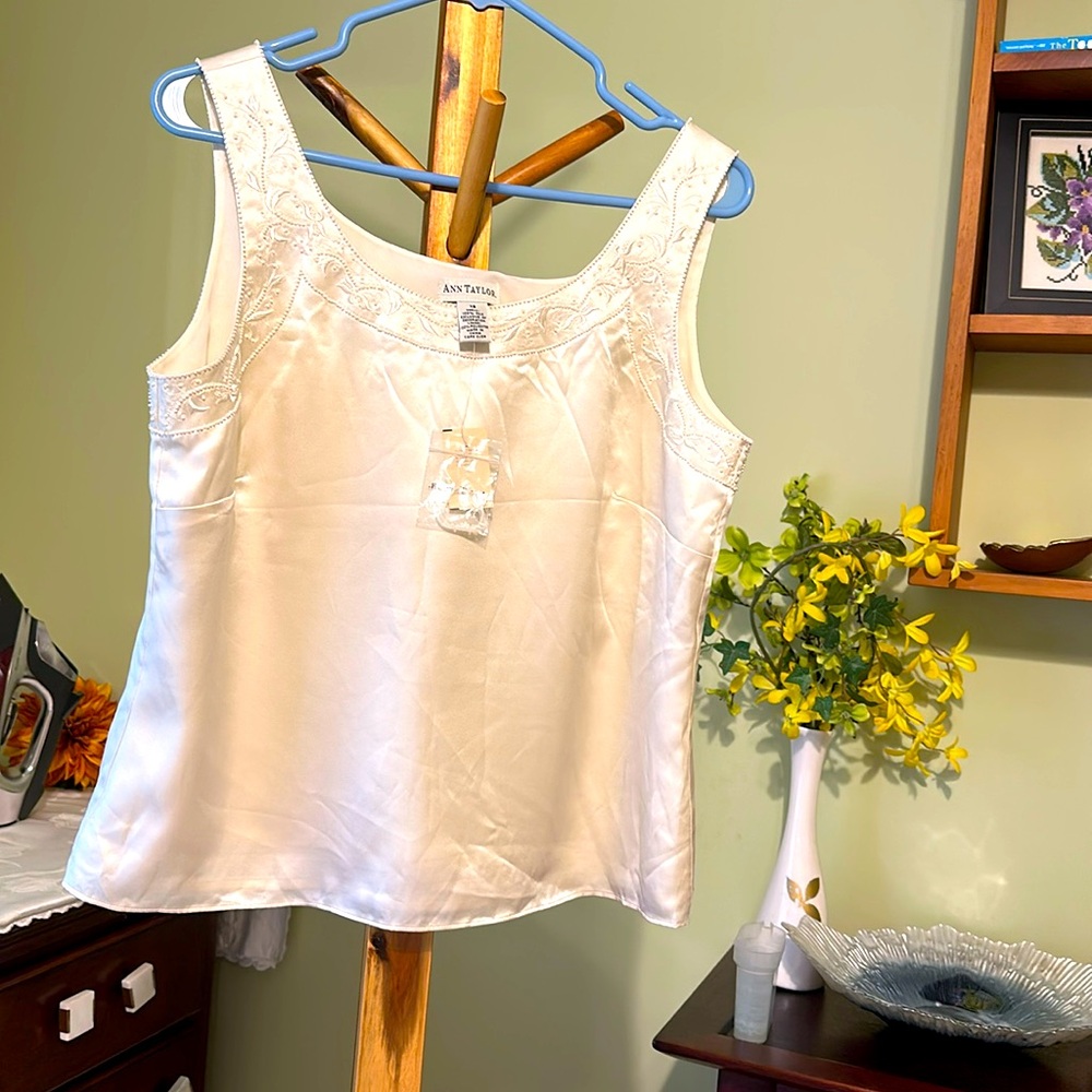 100 %Silk blouse ivory color. Embroidery and beads.